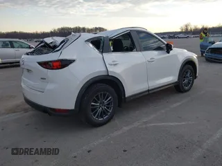 2019 Mazda CX-5 Sport with VIN JM3KFABMXK1655302, listed as a IAAI auction lot 41901293 with 140,369 mi miles and . Bid and sale history available at DreamBid. Image 4.