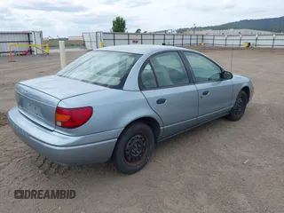 2002 Saturn SL z VIN 1G8ZS52842Z289815, wystawiony jako IAAI lot #42557607 z przebiegiem 184 671 mil mil oraz . Historia ofert i sprzedaży dostępna na DreamBid. Obrazek 4.