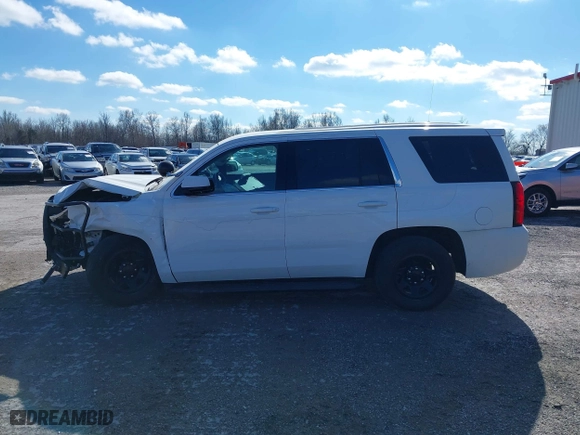 2020 Chevrolet Tahoe Commercial with VIN 1GNSKDEC2LR217697, listed as a IAAI auction lot 40815499 with 128,503 mi miles. Bid and sale history available at carsss.com. Image 14.