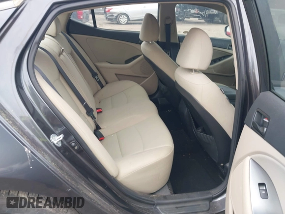 2015 Kia Optima LX with VIN KNAGM4A75F5626707, listed as a IAAI auction lot 42148396 with 84,189 mi miles and . Bid and sale history available at DreamBid. Image 8.