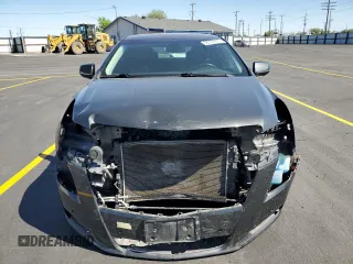 2013 Cadillac XTS Luxury with VIN 2G61R5S32D9216672, listed as a Copart auction lot 58392955 with 94,272 mi miles and Salvage title. Bid and sale history available at DreamBid. Image 5.