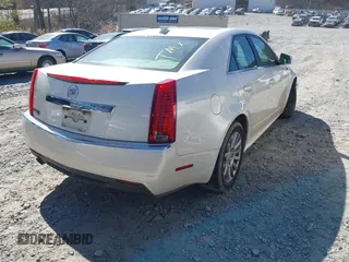 2011 Cadillac CTS Luxury z VIN 1G6DE5EY0B0159993, wystawiony jako IAAI lot #41831001 z przebiegiem 94 754 mil mil oraz . Historia ofert i sprzedaży dostępna na DreamBid. Obrazek 4.