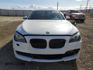 2011 BMW 7 Series 740Li with VIN WBAKB4C58BC573888, listed as a Copart auction lot 78736874 with 76,832 mi miles and Salvage Title. Bid and sale history available at DreamBid. Image 5.