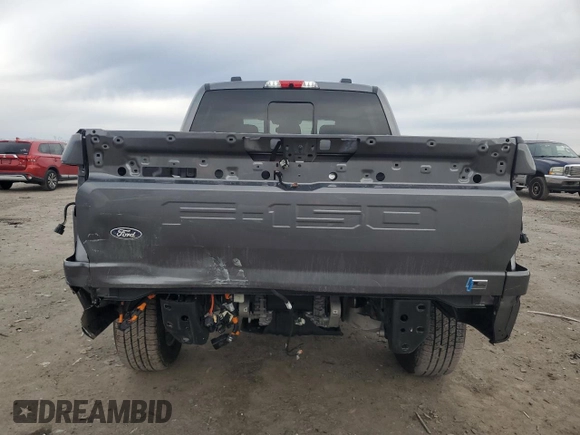 2024 Ford F-150 Lightning Lariat with VIN 1FT6W5L79RWG19060, listed as a Copart auction lot 43415085 with 2,733 mi miles and Salvage title. Bid and sale history available at DreamBid. Image 6.