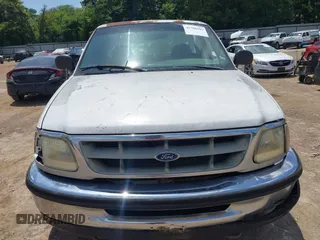 1998 Ford F-150 with VIN 1FTZF1724WKB57921, listed as a IAAI auction lot 42706692 with 213,913 mi miles and . Bid and sale history available at DreamBid. Image 6.