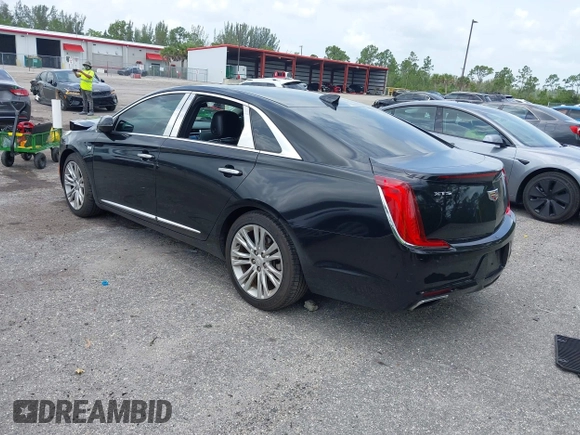 2019 Cadillac XTS Luxury with VIN 2G61M5S33K9115359, listed as a IAAI auction lot 42612026 with 246,165 mi miles and . Bid and sale history available at DreamBid. Image 3.