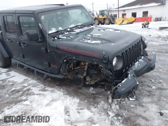 2021 Jeep Gladiator Rubicon z VIN 1C6JJTBG5ML605799, wystawiony jako IAAI lot #41190679 z przebiegiem 47 550 mil mil oraz . Historia ofert i sprzedaży dostępna na DreamBid. Obrazek 17.