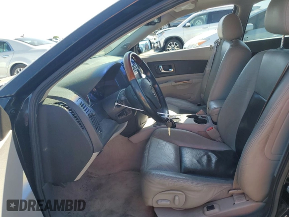 2005 Cadillac CTS z VIN 1G6DP567350157367, wystawiony jako Copart lot #52534565 z przebiegiem 147 959 mil mil oraz Szkoda całkowita • Salvage title. Historia ofert i sprzedaży dostępna na DreamBid. Obrazek 7.