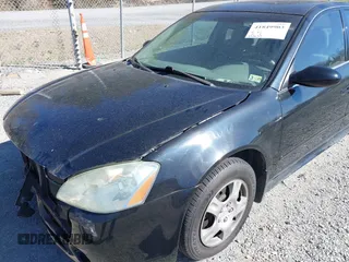 2003 Nissan Altima S with VIN 1N4AL11D33C320084, listed as a IAAI auction lot 41849903 with 212,137 mi miles. Bid and sale history available at carsss.com. Image 17.