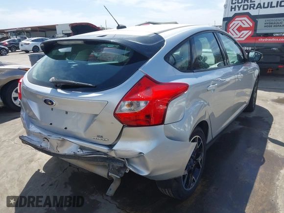 2013 Ford Focus SE with VIN 1FADP3K2XDL123506, listed as a IAAI auction lot 41764301 with 149,246 mi miles. Bid and sale history available at carsss.com. Image 4.