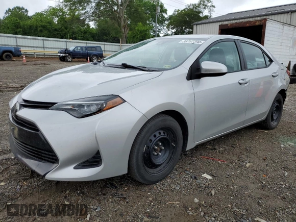 2019 Toyota Corolla L z VIN 5YFBURHE8KP898714, wystawiony jako Copart lot #56707395 z przebiegiem 86 665 mil mil oraz Szkoda całkowita • Salvage title. Historia ofert i sprzedaży dostępna na DreamBid. Obrazek 1.