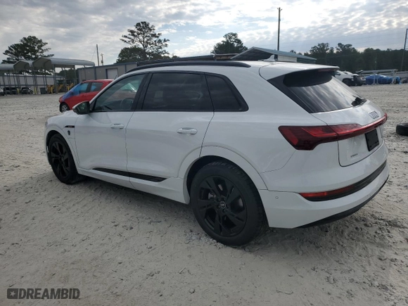 2021 Audi e-tron Premium with VIN WA1AAAGEXMB012122, listed as a Copart auction lot 75797084 with 27,971 mi miles and Salvage Title. Bid and sale history available at carsss.com. Image 2.