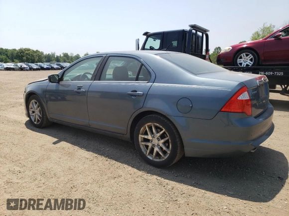 2012 Ford Fusion SEL z VIN 3FAHP0JG7CR332022, wystawiony jako Copart lot #60785765 z przebiegiem 112 202 mil mil oraz Szkoda całkowita • Salvage title. Historia ofert i sprzedaży dostępna na DreamBid. Obrazek 2.