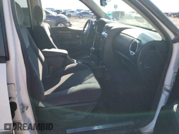 2008 GMC Envoy SLE1 with VIN 1GKDS13S282205712, listed as a Copart auction lot 88420825 with Not Provided miles and Salvage Title. Bid and sale history available at DreamBid. Image 7.