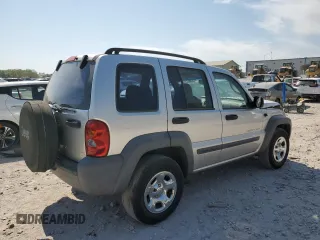 2003 Jeep Liberty Sport with VIN 1J4GK48K73W725175, listed as a Copart auction lot 53801155 with 104,727 mi miles and Salvage Title. Bid and sale history available at DreamBid. Image 3.