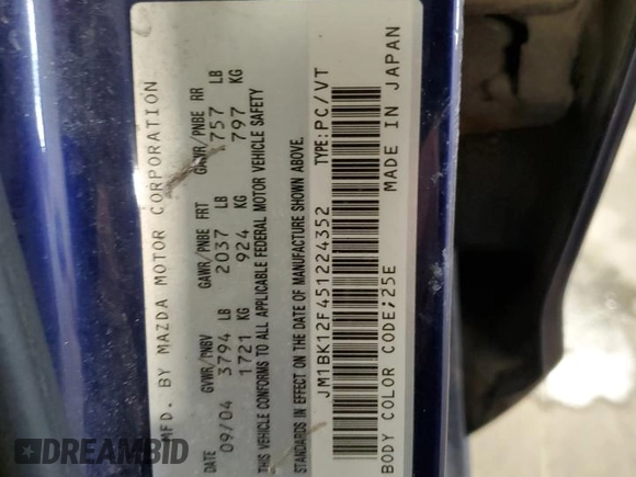 2005 Mazda 3 i with VIN JM1BK12F451224352, listed as a Copart auction lot 44708585 with 156,698 mi miles and Salvage Title. Bid and sale history available at DreamBid. Image 12.