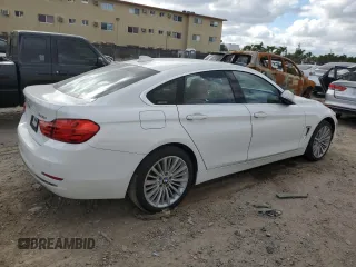 2015 BMW 4 Series 428i xDrive with VIN WBA4C9C53FG135314, listed as a Copart auction lot 82090253 with 93,188 mi miles and . Bid and sale history available at DreamBid. Image 3.