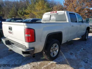 2017 GMC Sierra 1500 SLE with VIN 3GTU2MEC1HG262686, listed as a IAAI auction lot 41357646 with 141,377 mi miles. Bid and sale history available at carsss.com. Image 4.