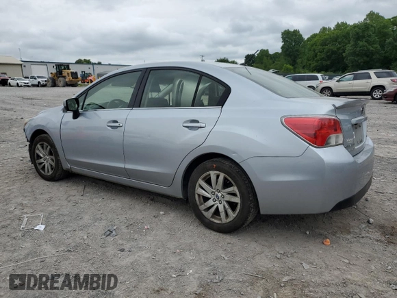 2015 Subaru Impreza Premium with VIN JF1GJAC61FH009064, listed as a Copart auction lot 56004865 with 221,066 mi miles and Salvage title. Bid and sale history available at DreamBid. Image 2.