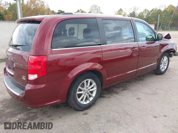 2019 Dodge Grand Caravan SXT with VIN 2C4RDGCGXKR585563, listed as a IAAI auction lot 40949350 with 122,577 mi miles and . Bid and sale history available at DreamBid. Image 4.
