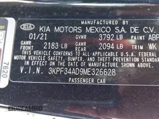 2021 Kia Forte GT-Line z VIN 3KPF34AD9ME326628, wystawiony jako IAAI lot #42675449 z przebiegiem 51 224 mil mil oraz . Historia ofert i sprzedaży dostępna na DreamBid. Obrazek 9.