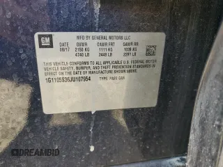 2018 Chevrolet Impala LT z VIN 1G1105S36JU107954, wystawiony jako Copart lot #54429925 z przebiegiem Nie podano mil oraz Szkoda całkowita • Salvage title. Historia ofert i sprzedaży dostępna na DreamBid. Obrazek 12.