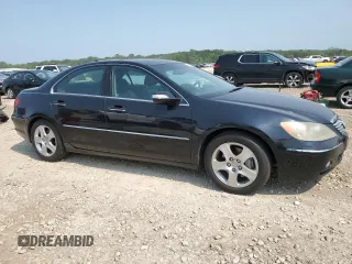 2006 Acura RL with VIN JH4KB16586C003133, listed as a Copart auction lot 63238494 with 228,039 mi miles and Salvage Title. Bid and sale history available at DreamBid. Image 4.