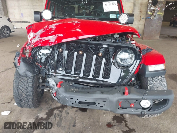 2021 Jeep Gladiator Willys with VIN 1C6HJTAG7ML602130, listed as a IAAI auction lot 42161745 with 49,576 mi miles and . Bid and sale history available at DreamBid. Image 6.