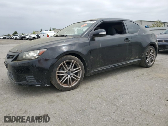 2012 Scion tC z VIN JTKJF5C75C3036478, wystawiony jako Copart lot #53190045 z przebiegiem 140 592 mil mil oraz Czysty tytuł • Clean title. Historia ofert i sprzedaży dostępna na DreamBid. Obrazek 1.