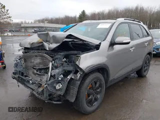 2013 Kia Sorento LX with VIN 5XYKT3A62DG349522, listed as a IAAI auction lot 38563127 with 127,205 mi miles and . Bid and sale history available at carsss.com. Image 2.