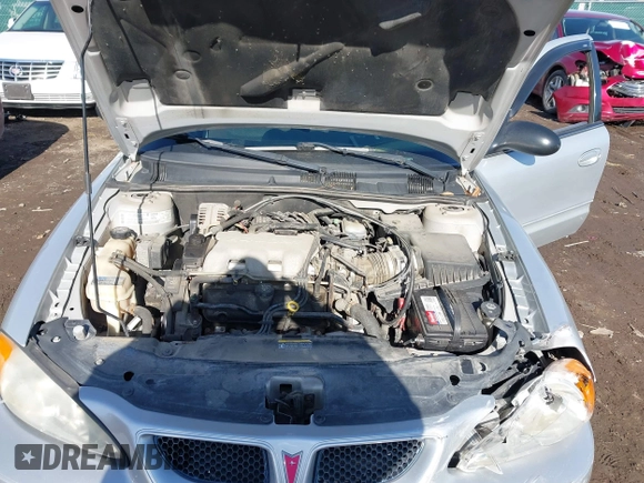 2004 Pontiac Grand Am SE1 with VIN 1G2NF52E54M646874, listed as a IAAI auction lot 41564072 with 97,437 mi miles. Bid and sale history available at carsss.com. Image 10.