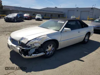 2001 Cadillac Eldorado ESC with VIN 1G6EL12Y91B100824, listed as a Copart auction lot 50643035 with 138,659 mi miles and Salvage Title. Bid and sale history available at carsss.com. Image 1.