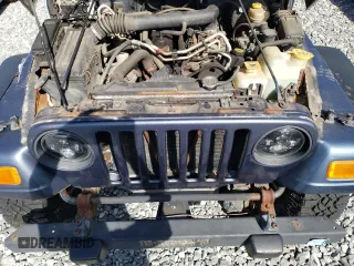 2002 Jeep Wrangler Sport with VIN 1J4FA49S92P715480, listed as a Copart auction lot 55157545 with 153,560 mi miles and Clean Title. Bid and sale history available at carsss.com. Image 12.