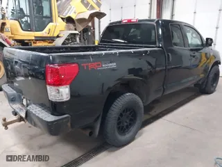2013 Toyota Tundra 4WD Truck with VIN 5TFUW5F17DX305344, listed as a IAAI auction lot 41310441 with 291,061 mi miles. Bid and sale history available at carsss.com. Image 4.