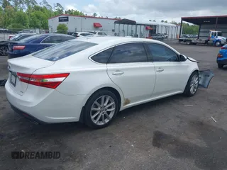 2013 Toyota Avalon XLE with VIN 4T1BK1EB4DU047982, listed as a IAAI auction lot 42011402 with 122,645 mi miles and . Bid and sale history available at DreamBid. Image 4.