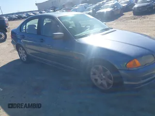 1999 BMW 3 Series 323i with VIN WBAAM333XXCA83588, listed as a IAAI auction lot 41813684 with 1 mi miles. Bid and sale history available at carsss.com. Image 1.