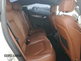 2017 Maserati Ghibli with VIN ZAM57XSA6H1233933, listed as a Copart auction lot 49089525 with 76,965 mi miles and Salvage Title. Bid and sale history available at carsss.com. Image 10.