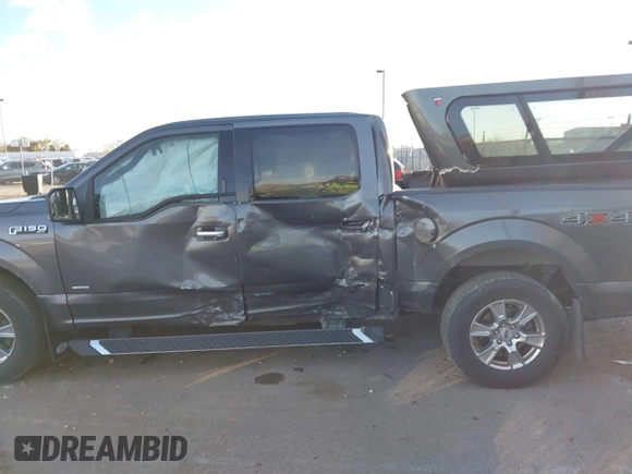 2015 Ford F-150 XLT with VIN 1FTEW1EP1FKE16670, listed as a IAAI auction lot 41120641 with 102,770 mi miles. Bid and sale history available at carsss.com. Image 14.
