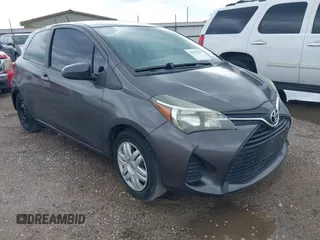2015 Toyota Yaris L with VIN VNKJTUD33FA054166, listed as a IAAI auction lot 41993354 with 98,657 mi miles. Bid and sale history available at carsss.com. Image 1.