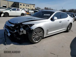 2018 Kia Stinger with VIN KNAE15LAXJ6012401, listed as a Copart auction lot 89369765 with 84,964 mi miles and Salvage Title. Bid and sale history available at carsss.com. Image 1.