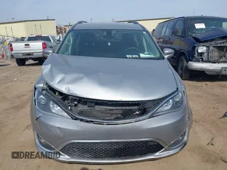 2018 Chrysler Pacifica Touring L with VIN 2C4RC1BG7JR101736, listed as a IAAI auction lot 41776231 with 90,487 mi miles and . Bid and sale history available at DreamBid. Image 12.