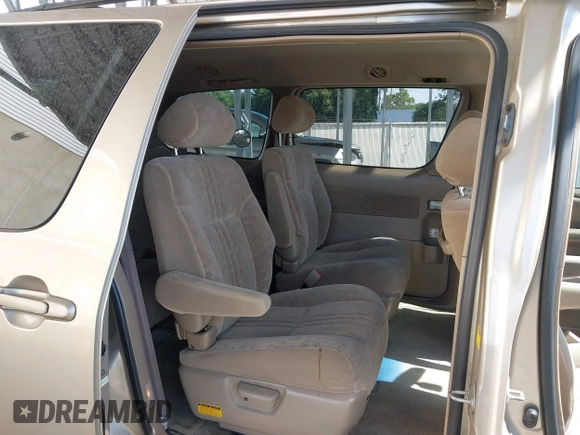 2002 Toyota Sienna LE with VIN 4T3ZF13C82U465335, listed as a IAAI auction lot 40274809 with 178,560 mi miles and . Bid and sale history available at DreamBid. Image 8.