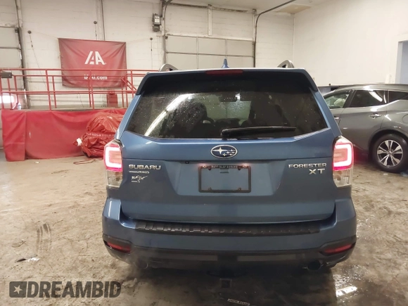 2017 Subaru Forester Touring with VIN JF2SJGTC9HH410251, listed as a IAAI auction lot 41411079 with 131,220 mi miles and . Bid and sale history available at DreamBid. Image 16.