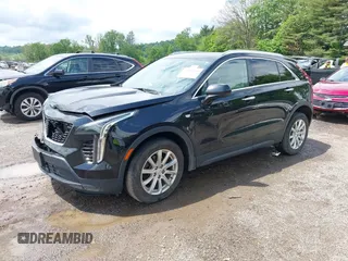 2019 Cadillac XT4 AWD Luxury z VIN 1GYFZBR41KF150209, wystawiony jako IAAI lot #42325529 z przebiegiem 76 828 mil mil oraz . Historia ofert i sprzedaży dostępna na DreamBid. Obrazek 2.