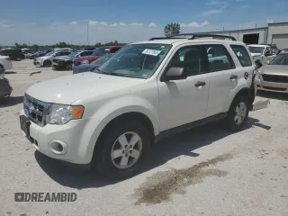 2012 Ford Escape XLS with VIN 1FMCU0C75CKB39328, listed as a Copart auction lot 62127665 with 118,288 mi miles and Salvage title. Bid and sale history available at DreamBid. Image 1.