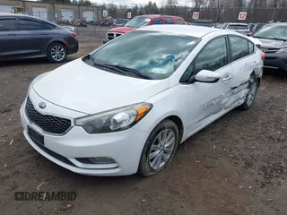 2014 Kia Forte EX with VIN KNAFX4A8XE5050378, listed as a IAAI auction lot 41923798 with 104,712 mi miles. Bid and sale history available at carsss.com. Image 2.