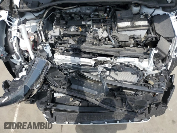 2023 Toyota Corolla Cross LE with VIN 7MUCAAAG2PV053730, listed as a Copart auction lot 54825035 with 33,313 mi miles and Salvage title. Bid and sale history available at DreamBid. Image 12.