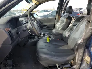 1999 Jeep Grand Cherokee Laredo with VIN 1J4GW58S0XC653687, listed as a Copart auction lot 81166844 with 252,330 mi miles and Salvage Title. Bid and sale history available at carsss.com. Image 7.