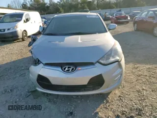 2012 Hyundai Veloster w/Gray Int с VIN KMHTC6AD2CU050738, выставлен на аукционе Copart как лот 42136435 с пробегом 151 482 миль миль и Списание • Salvage title. История ставок и продаж доступна на DreamBid. Изображение 11.