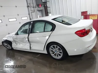 2018 BMW 3 Series 320i xDrive with VIN WBA8E5G56JNU47338, listed as a IAAI auction lot 41238204 with 54,596 mi miles. Bid and sale history available at carsss.com. Image 14.
